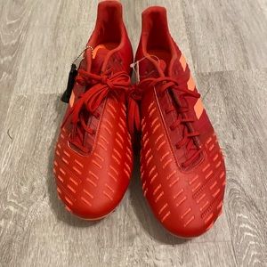 I am selling red and orange soccer cleats that are brand new with the tags